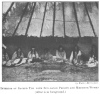 INTERIOR OF SACRED TIPI WITH SUN-DANCE PRIESTS AND MEDICINE WOMEN<br> (Altar is in foreground.)