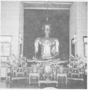 A Buddha statue. Similar statues are   found in every Buddhist place of worship.