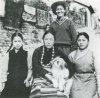 55 (below): The famous Tensing Norgay, Conqueror of Everest, and his family at home. It is his people, the Sherpas of Nepal, who first led the world to the ABSMs. (Information Bureau, Government of India)