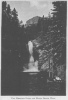TWO MEDICINE FALLS AND MOUNT RISING WOLF.