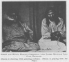 ONESTA AND NITANA HOLDING CEREMONIAL WITH SACRED MOUNTAIN LION CLAW NECKLACE.<br> (Onesta is chanting while painting necklace. Nitana is praying with the Pipe.)